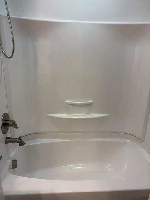 Bathtub and shower surround